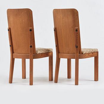 Axel Einar Hjorth, a pair of "Lovö" stained pine chairs, Nordiska Kompaniet, Sweden 1930's.