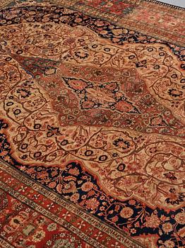 A CARPET, an antique/semi-antique Kashan so called Motachem, ca 333,5-354 x 218-243 cm.