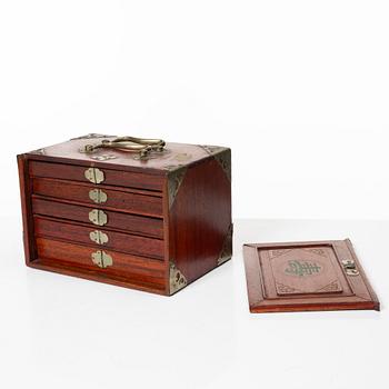 A Mahjong game in a hardwood box, China, first half of the 20th century.