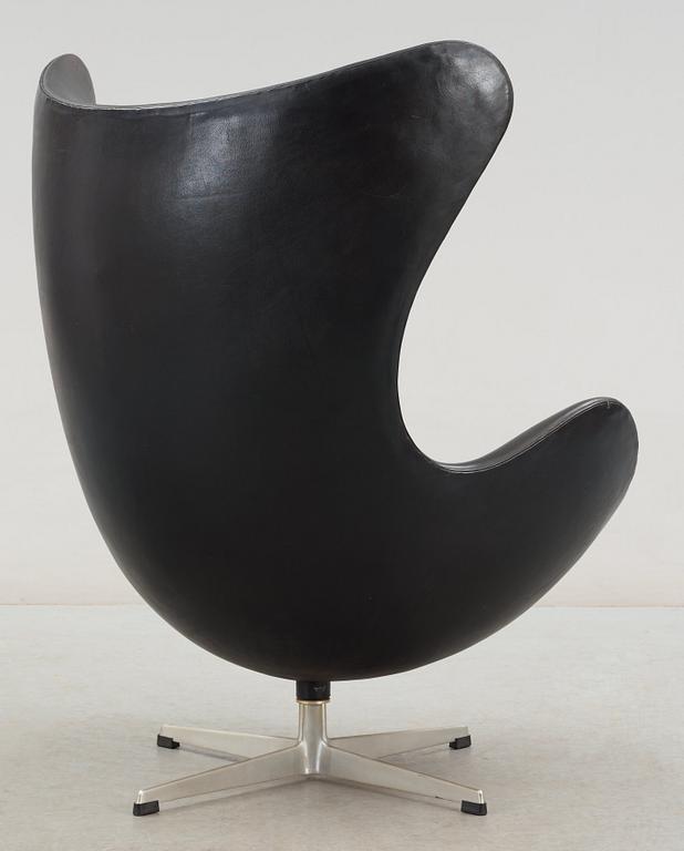 An Arne Jacobsen black leather 'Egg Chair', Fritz Hansen, Denmark 1964.