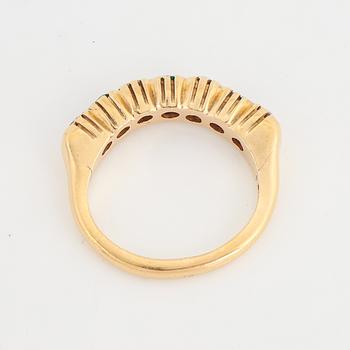 Elon Arenhill, ring with diamond and emeralds.