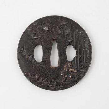 A round iron tsuba, mumei, Japan, Edo-period.