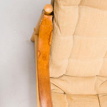BROR BOIJE, A pair of 'Junker' easy chairs and an ottoman for Dux, Sweden, latter half of the 20th Century.