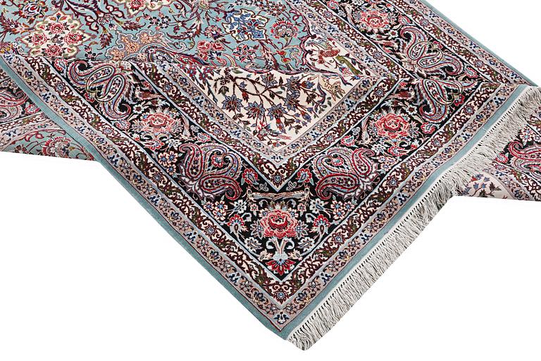 A rug, Esfahan, part silk, c. 238 x 154 cm.