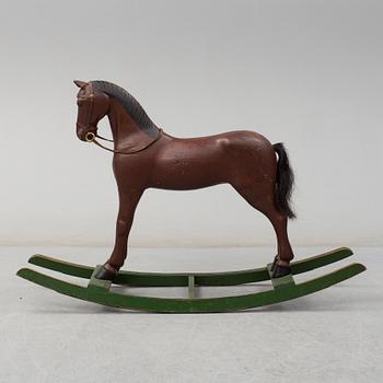An early 20th century rocking horse.
