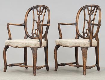 An Axel Einar Hjorth set of 4 Swedish Grace chairs and a pair of armchairs, 'Östanå', Nordiska Kompaniet, 1929.