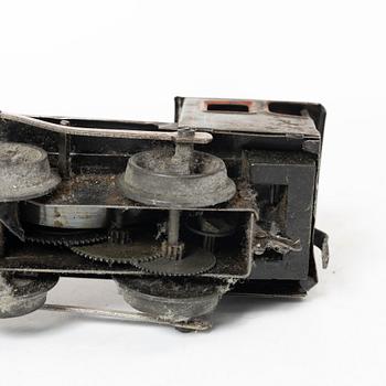 Model train with track and station building, 13 pieces, Germany, 1920s.