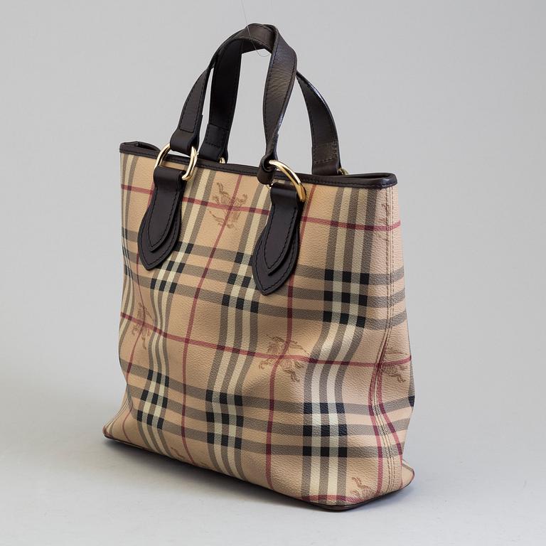 A nova-check bag by Burberry.