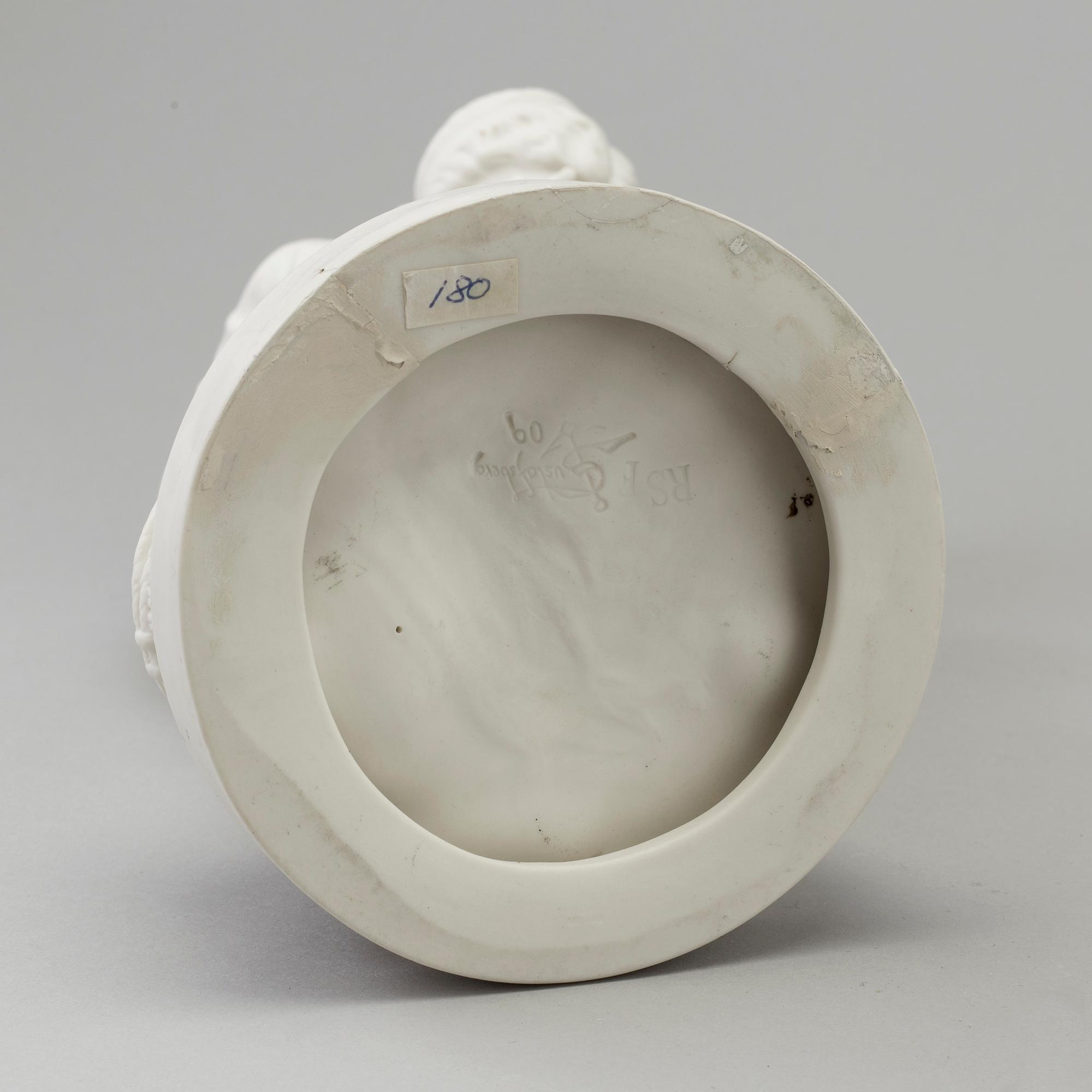 A biscuit figure of a woman and a boy, Gustafsberg, early 20th Century.
