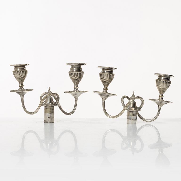 A pair of English silver candelabra, mark of Hawksworth, Eyre & Co Ltd, Sheffield 1892.