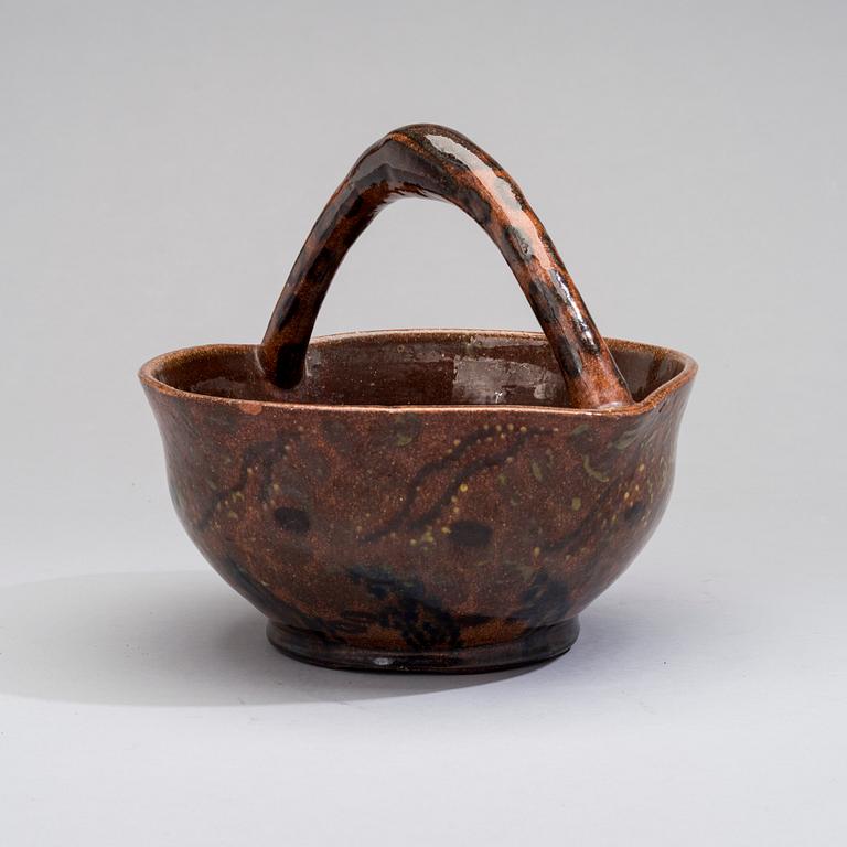 GERDA THESLEFF, A CERAMIC BASKET, signed GT, Finland 1918.