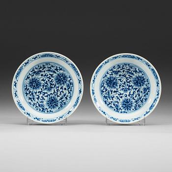 A pair of blue and white lotus dishes, Qing dynasty, 19th century with Daoguang seal mark.