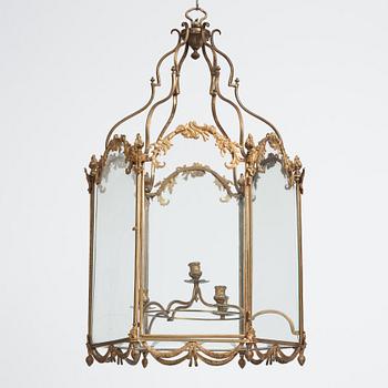 A Swedish rococo gilt-brass four-light lantern, possibly a masterpiece, Stockholm, later part of the 18th century.