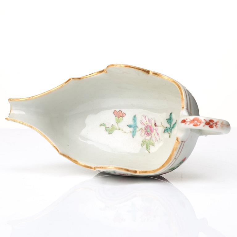 A pair of famille rose 'double peacock sauce boats, Qing dynasty, Qianlong (1736-95).