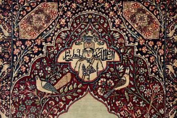 An antique Kirman Laver figural, Southeastern Iran, c. 220 x 135 cm.