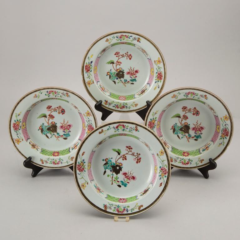 A set of four Chinese famille rose Qianlong porcelain plates.