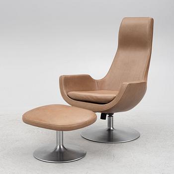 Carl-Henrik Spek, a Clipper armchair with ottoman, Ire Möbler, Tibro, Sweden, 21st century.