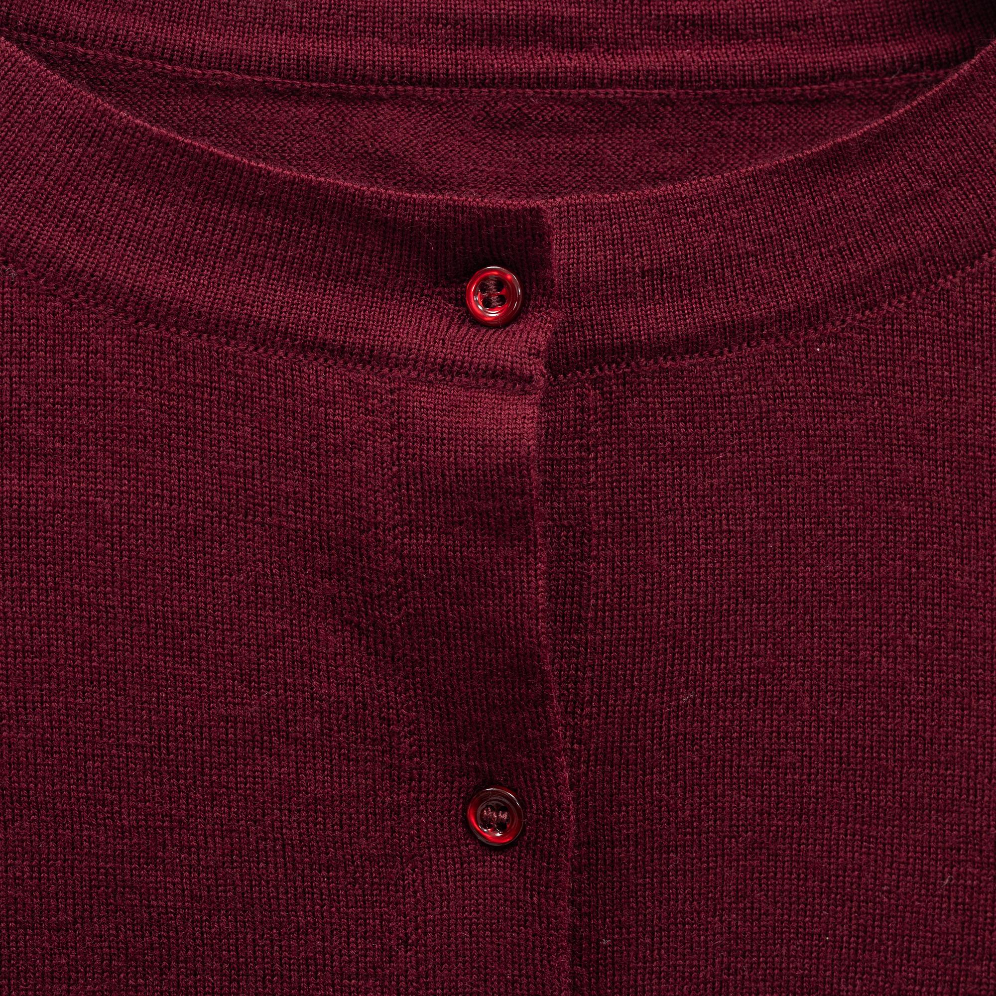 Alaïa, a burgundy wool twin set with cardigan and top, French size 38.