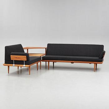 A set of two Danish 'Minerva' sofas with a table for France & Daverkosen.