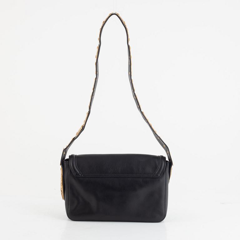 Valentino Red, A black leather snake bag.