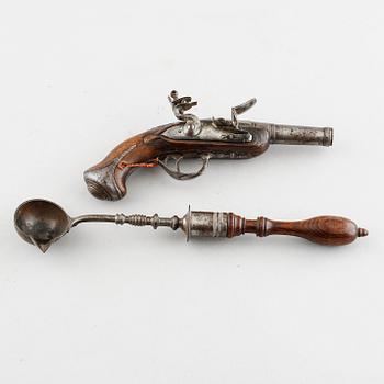 A flintlock gun, 18th century.