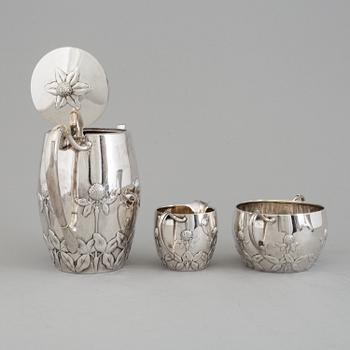 A Danish Arts and crafts sterling silver three piece coffee set, Niels Georg Henriksen for A. Michelsen, 1906 and 1921.