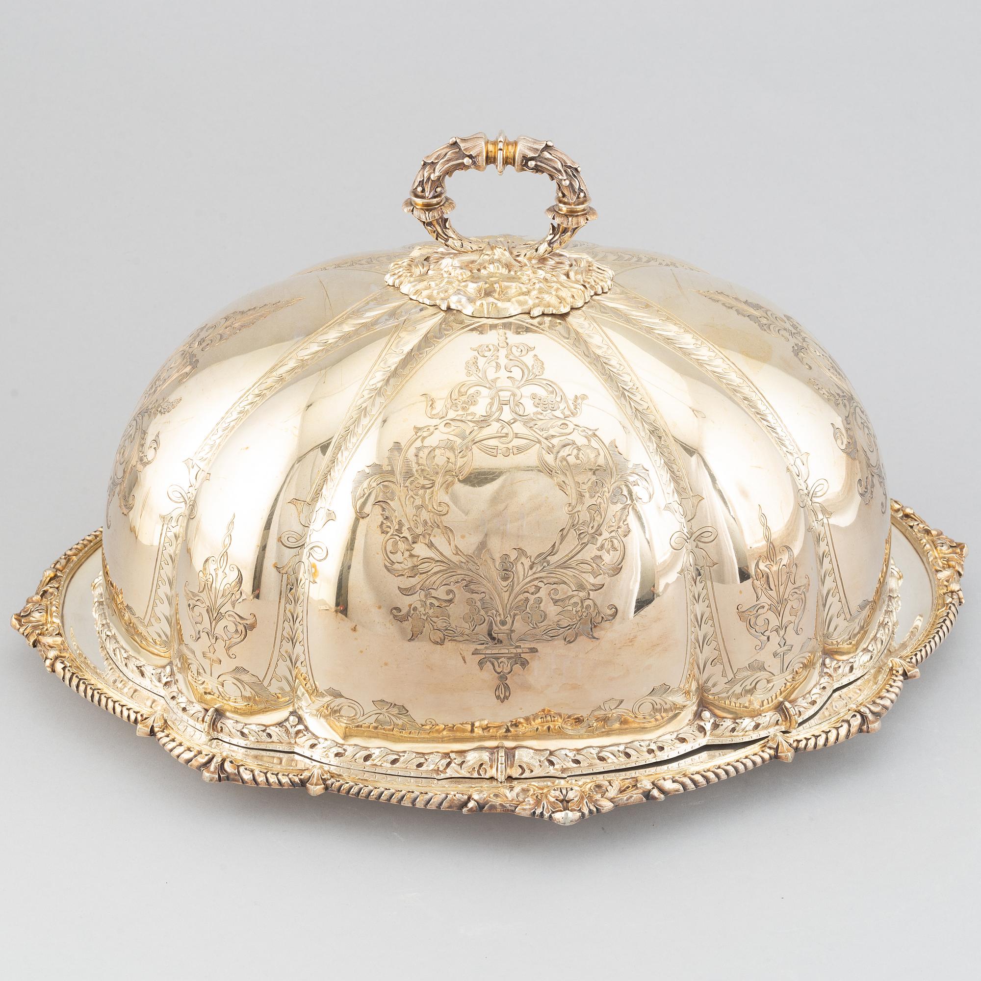 A silver plated cover by Martin, Hall & Co, Sheffield, and dish.