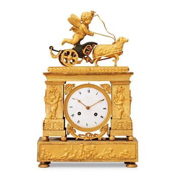 1487. A French Empire early 19th century mantel clock.
