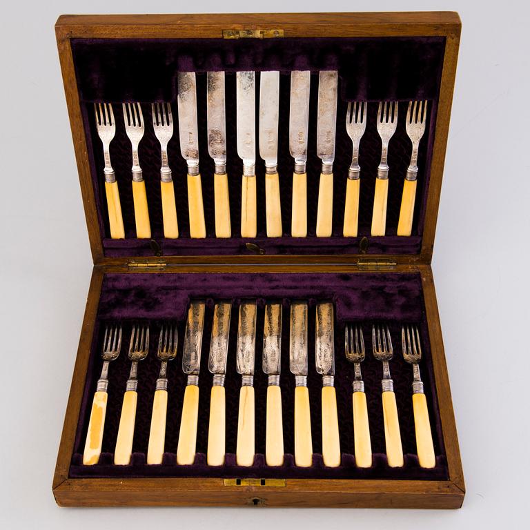 CUTLERY, 12+12, silver with bone handles, Sheffield 1894.