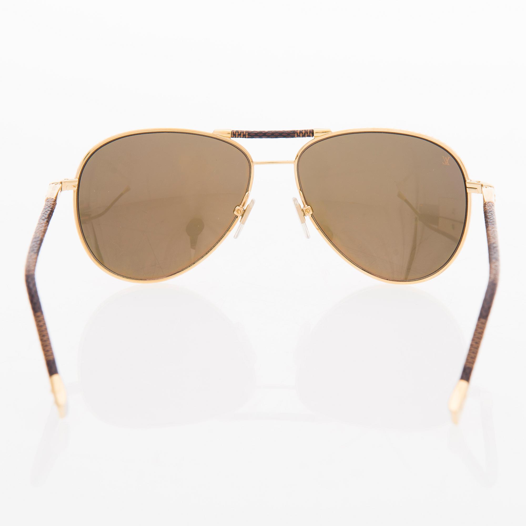 LOUIS VUITTON, A Pair of Conspiration Pilote Sunglasses.