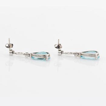 A pair of 18K white gold and aquamarine drop earrings set with round brilliant- and eight-cut diamonds.