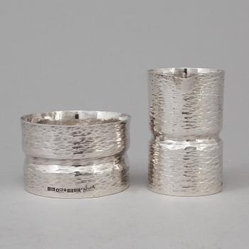 A silver Sugar bowl and a creamer by MICHAEL CHAVANNE, Stockholm 1977.