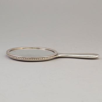 A Swedish silver hand mirror, maker's mark K. Anderson, Stockholm 1919.