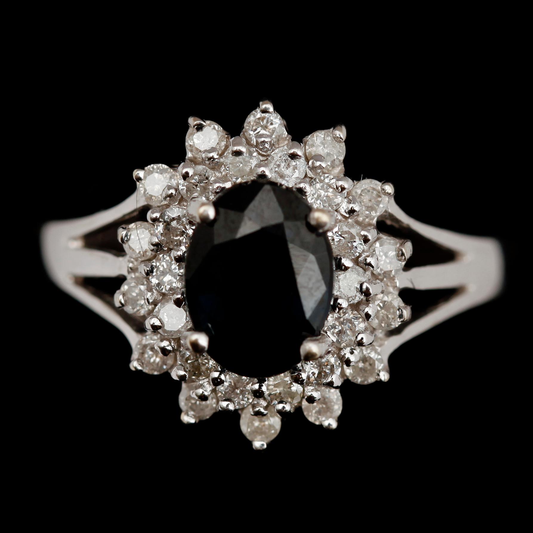 RING, 14 k vitguld, med safir och briljanter.