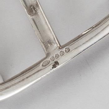 An English 20th century silver-plated toast rack, marked WH.