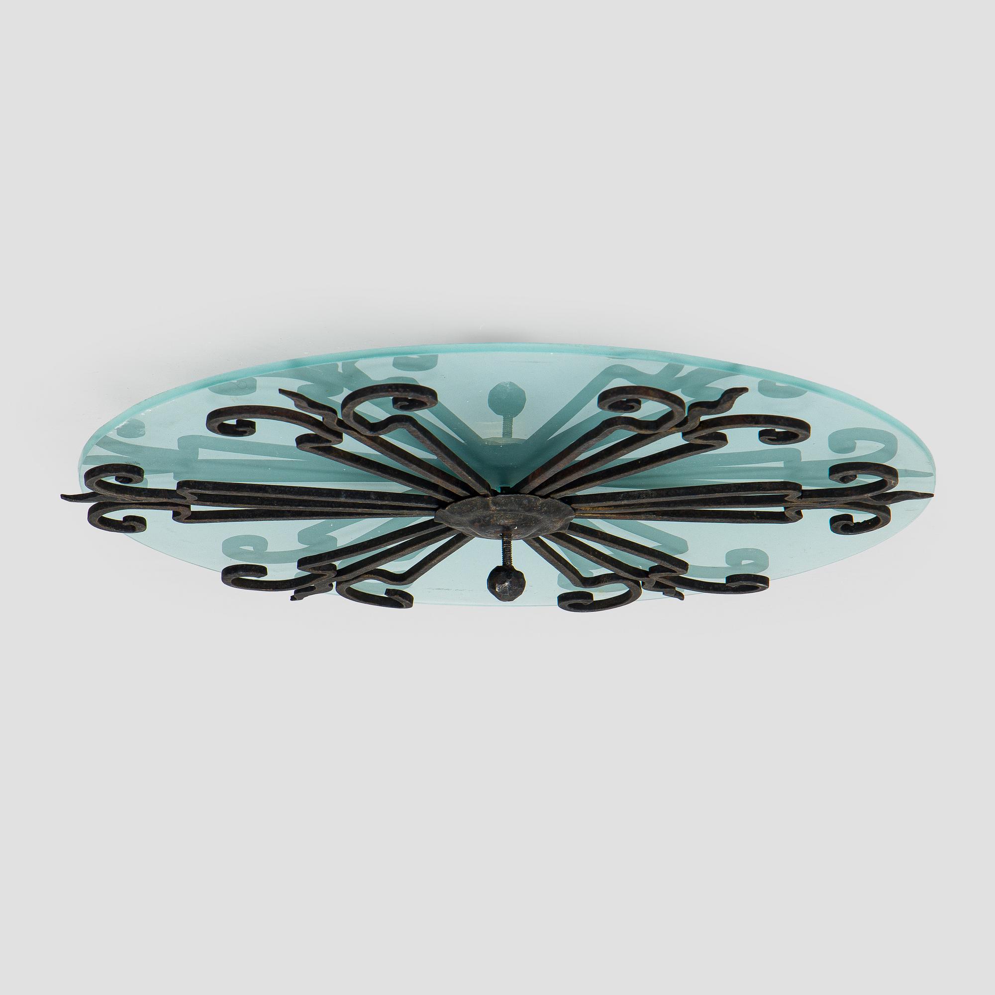 An early 20th century ceiling light.