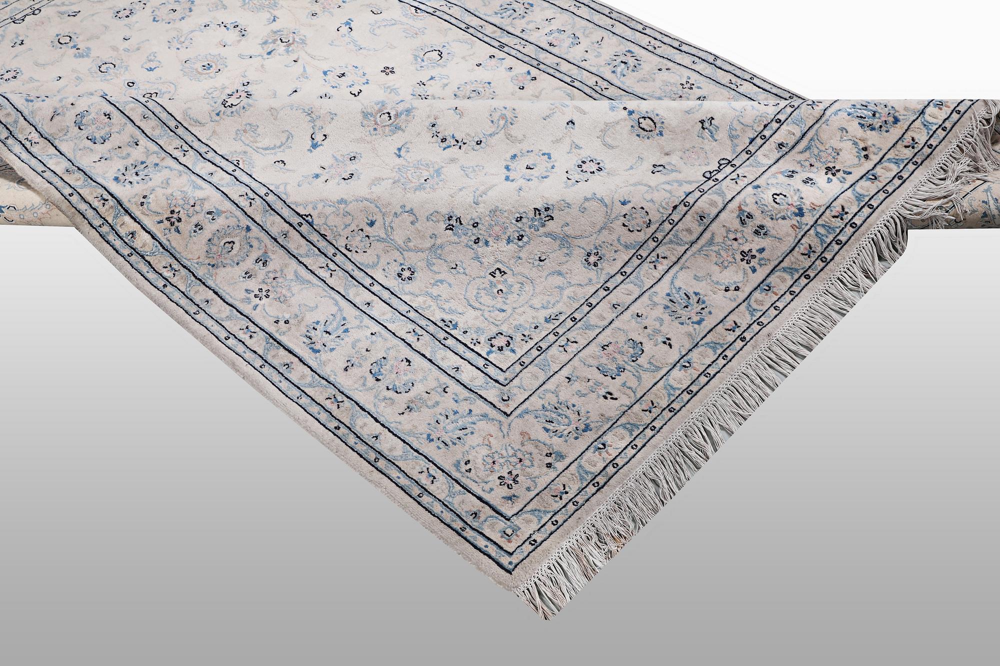 A rug, Nain, part silk, 6 Laa, ca 240 x 165 cm.