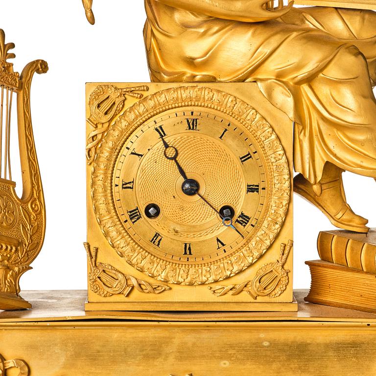 A French Empire mantle clock, early 19th century.