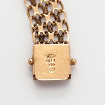 A 14K gold x-link bracelet. Finnish hallmarks 1975.