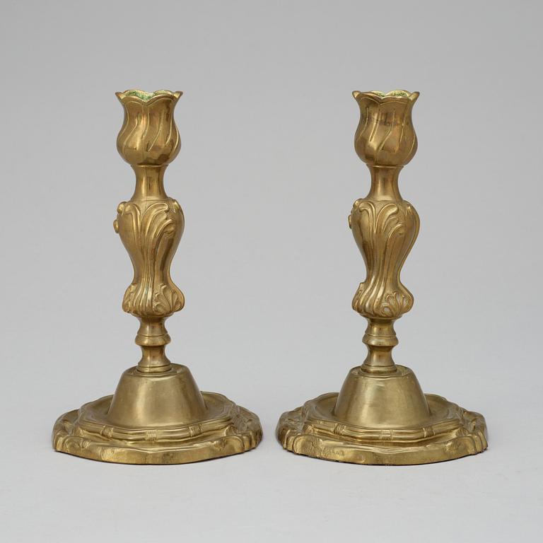 A pair of Swedish Rococo "argent haché" candlesticks by C.  C. Liendenberg, Stockholm 1767.