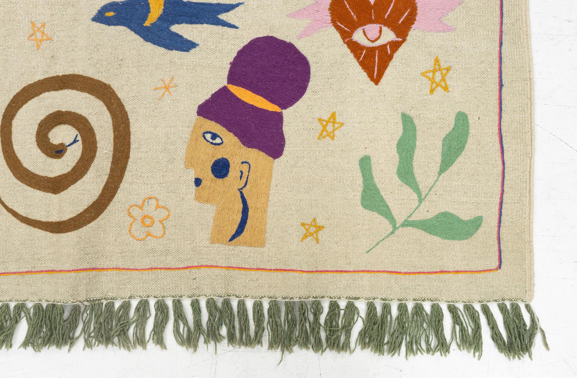 A hand-embroidered kilim carpet, c. 236 x 172 cm.