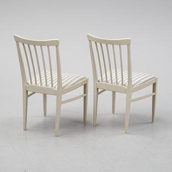 A dining table and six chairs by Carl Malmsten for Bodafors.