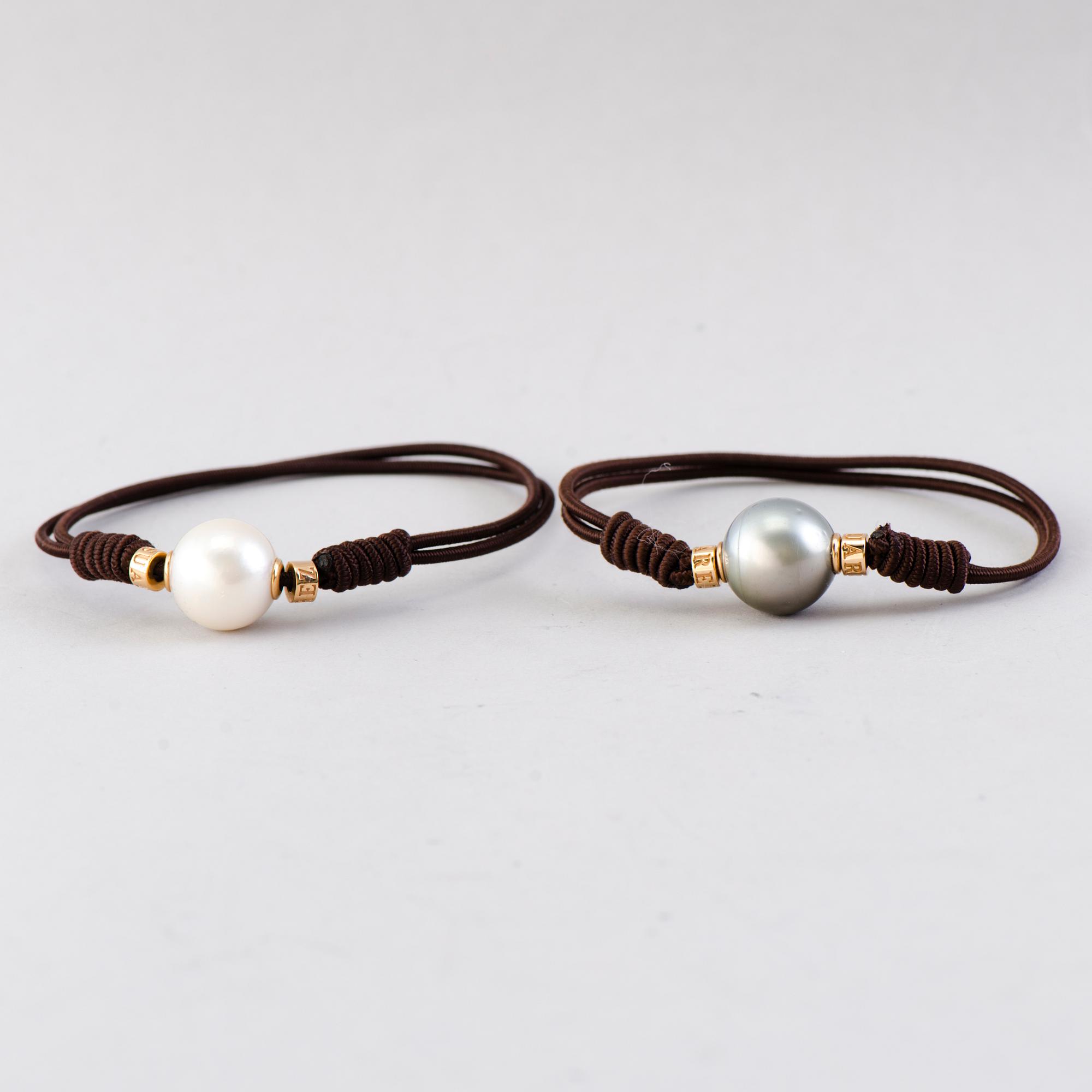 BRACELETS, 2 pcs, cultured pearls, 18K gold. Suarez, Spain.