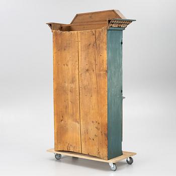 A Dalecarlian polychrome painted cabinet, dated 1798.