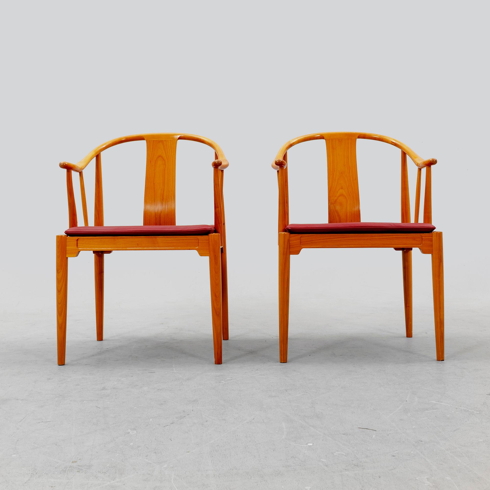 Hans J Wegner, a pair of "China" chairs for Fritz Hansen, Denmark, dated 1994.