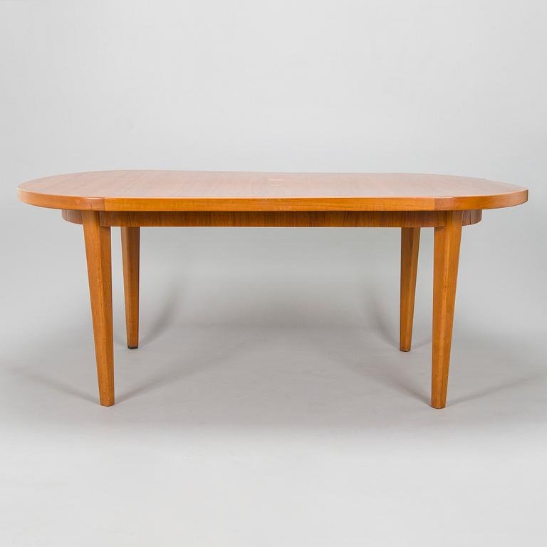 A mid-20th century dining table.