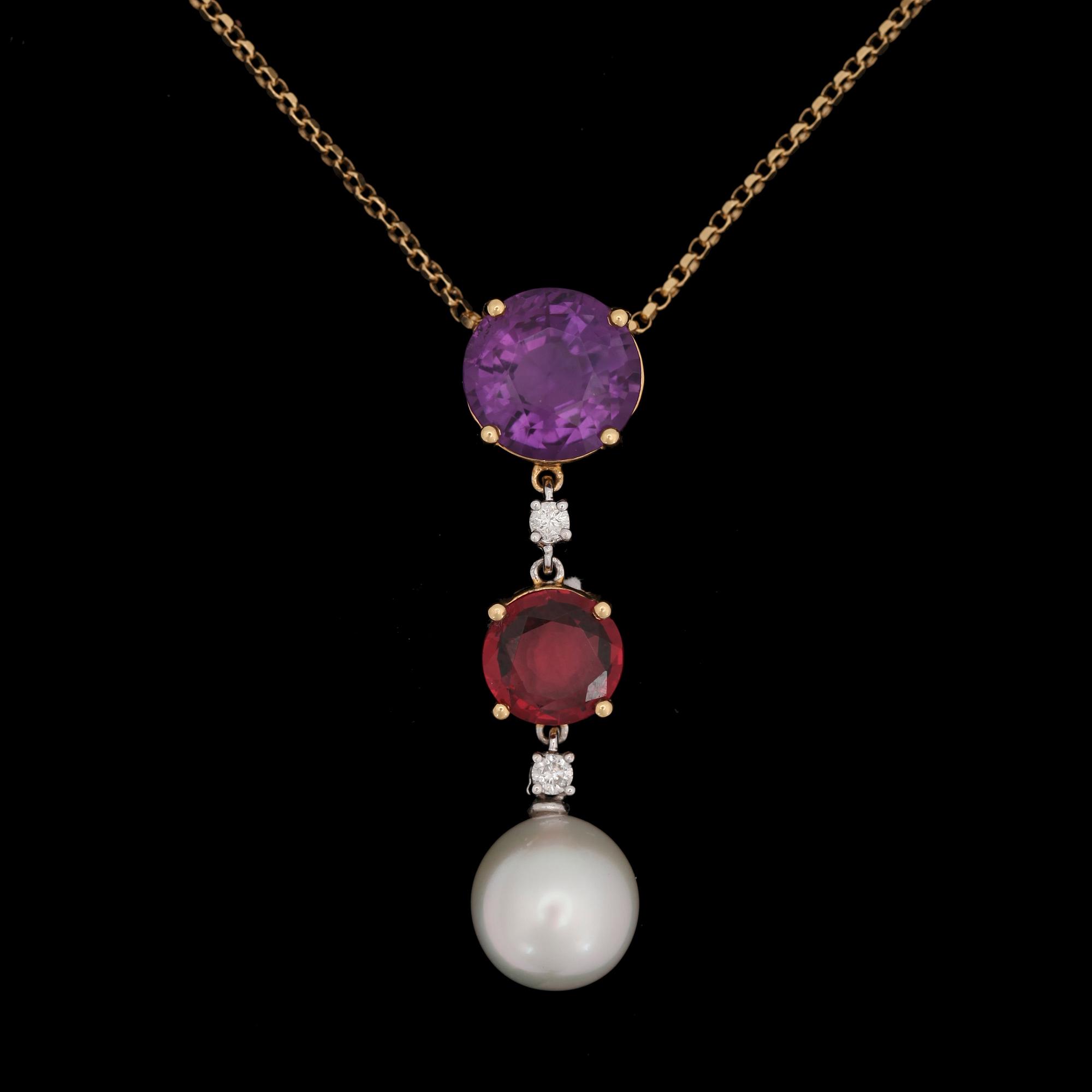 A cultured South sea pearl, amethyst and granet pendant set with a brilliant-cut diamonds, total carat weight 0.15 ct.