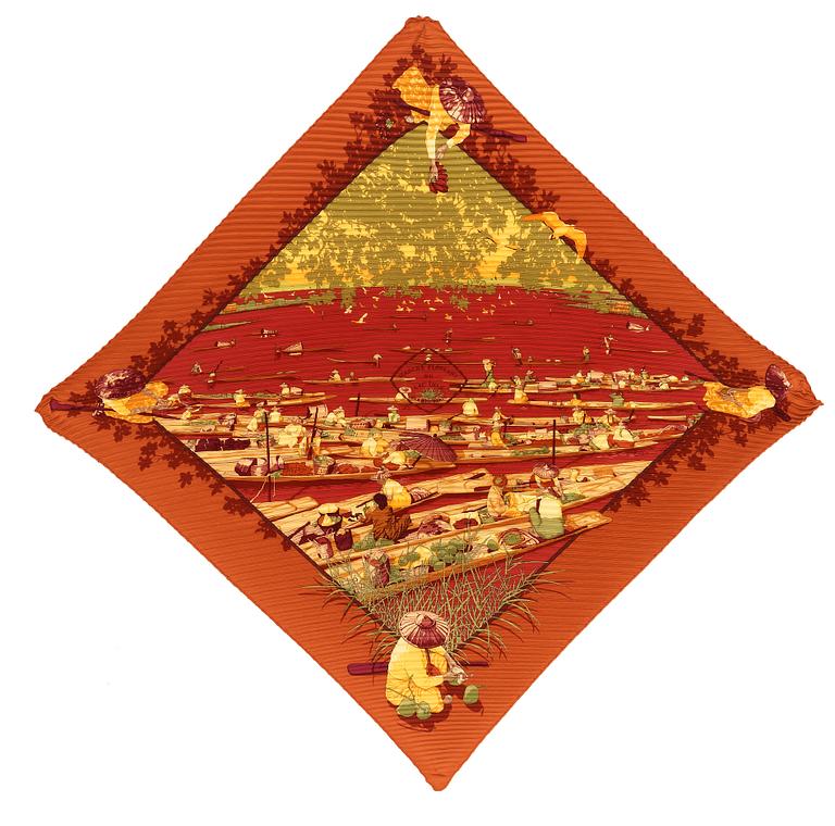 A silk scarf "Marché Flottant du Lac Inlé" by Hermès.