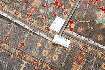 A Kazak carpet, c. 351 x 274 cm.