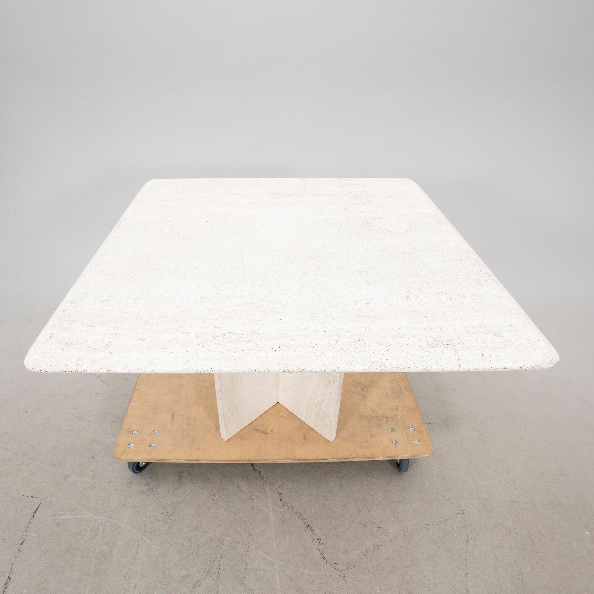 A polished travertine table from the second half of the 20th century.